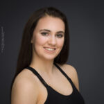 confidence, confident headshot, connection, head shot, headshot, performer headshot, spotlight headshot, spotlight profile image, strong headshot, studio headshot