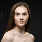 confidence, confident headshot, connection, head shot, headshot, performer headshot, spotlight headshot, spotlight profile image, strong headshot, studio headshot