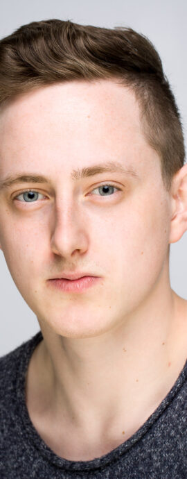 Cameron Hunter, Scottish dancer, confidence, confident headshot, connection, dancer, head shot, headshot, male dancer, performer headshot, spotlight headshot, spotlight profile image, strong headshot, studio headshot