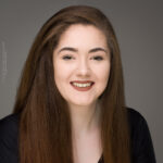 Elizabeth Gilmour, confidence, confident headshot, connection, dancer, dancer portfolio, head shot, headshot, performer headshot, spotlight headshot, spotlight profile image, strong headshot, studio headshot