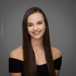 Dance For All, Emily Combe, confidence, confident headshot, connection, dancer, head shot, headshot, performer headshot, spotlight headshot, spotlight profile image, strong headshot, studio headshot
