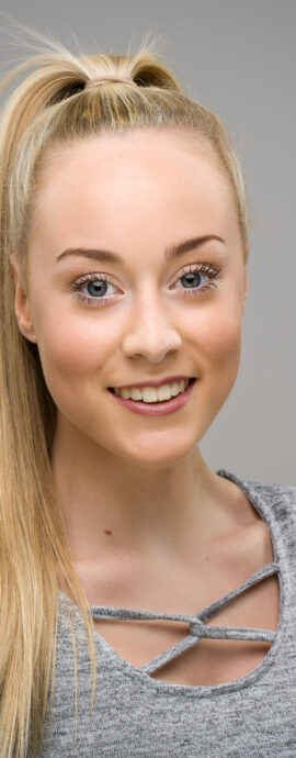 confidence, confident headshot, connection, head shot, headshot, performer headshot, spotlight headshot, spotlight profile image, strong headshot, studio headshot