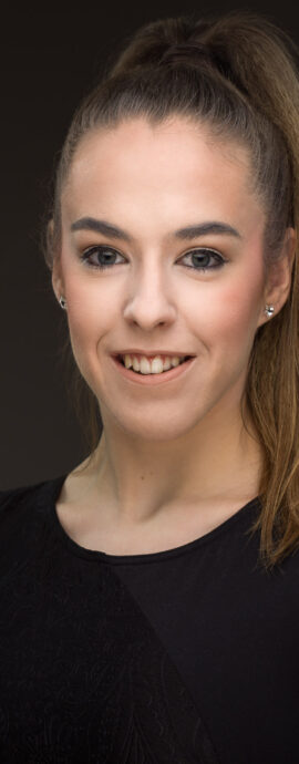 Holly Steel, confidence, confident headshot, connection, dancer, head shot, headshot, performer headshot, spotlight headshot, spotlight profile image, strong headshot, studio headshot