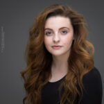 confidence, confident headshot, connection, head shot, headshot, performer headshot, spotlight headshot, spotlight profile image, strong headshot, studio headshot