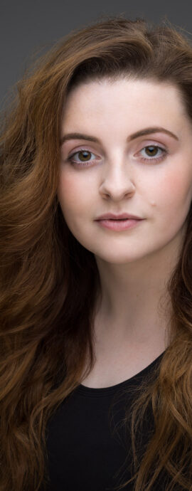 confidence, confident headshot, connection, head shot, headshot, performer headshot, spotlight headshot, spotlight profile image, strong headshot, studio headshot