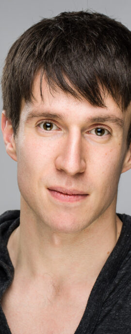 Juan Barton, confidence, confident headshot, connection, dancer, head shot, headshot, male dancer, performer headshot, spotlight headshot, spotlight profile image, strong headshot, studio headshot