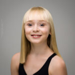 confidence, confident headshot, connection, head shot, headshot, performer headshot, spotlight headshot, spotlight profile image, strong headshot, studio headshot