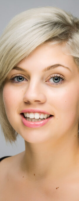 Katie Mclean, confidence, confident headshot, connection, head shot, headshot, performer, performer headshot, singer, spotlight headshot, spotlight profile image, strong headshot, studio headshot, vocalist