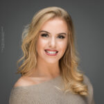 Laura McLellan, confidence, confident headshot, connection, dancer, head shot, headshot, performer headshot, spotlight headshot, spotlight profile image, strong headshot, studio headshot, vocalist headshot