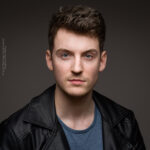 Lyall Reece Nelis, actor, confidence, confident headshot, connection, head shot, headshot, performer headshot, singer, spotlight headshot, spotlight profile image, strong headshot, studio headshot, vocalist, vocalist headshot