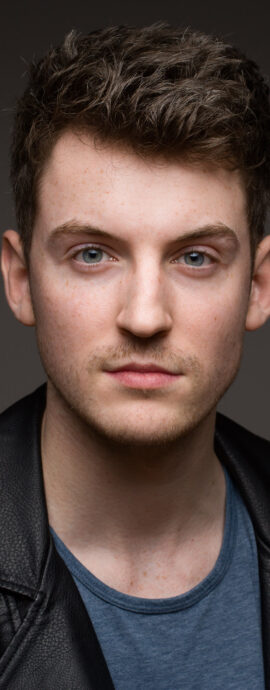 Lyall Reece Nelis, actor, confidence, confident headshot, connection, head shot, headshot, performer headshot, singer, spotlight headshot, spotlight profile image, strong headshot, studio headshot, vocalist, vocalist headshot