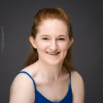 confidence, confident headshot, connection, head shot, headshot, performer headshot, spotlight headshot, spotlight profile image, strong headshot, studio headshot