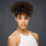 JazzArtUK, Mia Musakambeva, Scottish dancer, confidence, confident headshot, connection, dancer, dancer portfolio, head shot, headshot, performer headshot, spotlight headshot, spotlight profile image, strong headshot, studio headshot