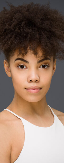 JazzArtUK, Mia Musakambeva, Scottish dancer, confidence, confident headshot, connection, dancer, dancer portfolio, head shot, headshot, performer headshot, spotlight headshot, spotlight profile image, strong headshot, studio headshot