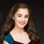 Robyn McKie, confidence, confident headshot, connection, head shot, headshot, performer headshot, spotlight headshot, spotlight profile image, strong headshot, studio headshot
