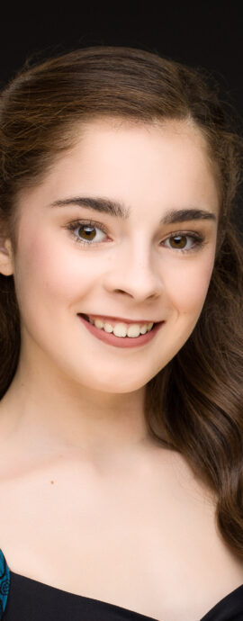 Robyn McKie, confidence, confident headshot, connection, head shot, headshot, performer headshot, spotlight headshot, spotlight profile image, strong headshot, studio headshot