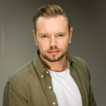 SL Talent, Stephen Dillon, confidence, confident headshot, connection, head shot, headshot, performer headshot, spotlight headshot, spotlight profile image, strong headshot, studio headshot, vocalist headshot