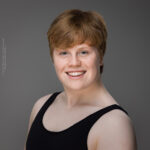 confidence, confident headshot, connection, dancer, dancer portfolio, head shot, headshot, male dancer, performer headshot, spotlight headshot, spotlight profile image, strong headshot, studio headshot