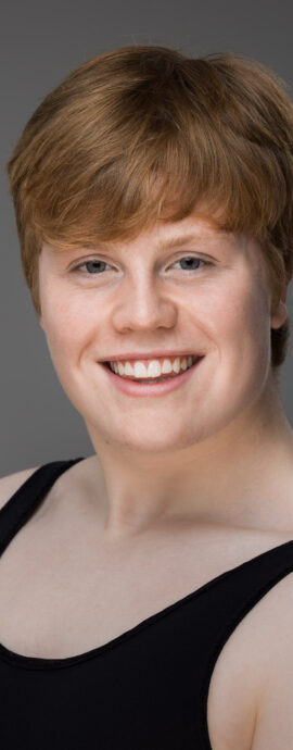 confidence, confident headshot, connection, dancer, dancer portfolio, head shot, headshot, male dancer, performer headshot, spotlight headshot, spotlight profile image, strong headshot, studio headshot