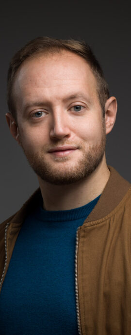David Carnan, actor, actor headshot, confidence, confident headshot, connection, head shot, headshot, performer headshot, spotlight headshot, spotlight profile image, strong headshot, studio headshot, vocalist headshot