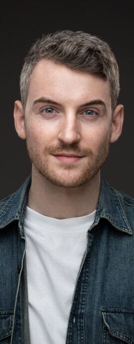 Lyall Reece Nelis, head shot, headshot, male portrait, musical theatre performer, performer, performer headshot, portrait, singer, studio, vocalist, vocalist headshot